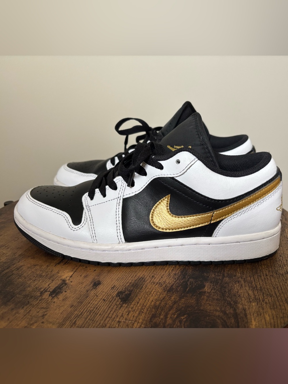 Jordan Air Jordan 1 Low Black Gold White Men's Low Top Athletic Sneakers